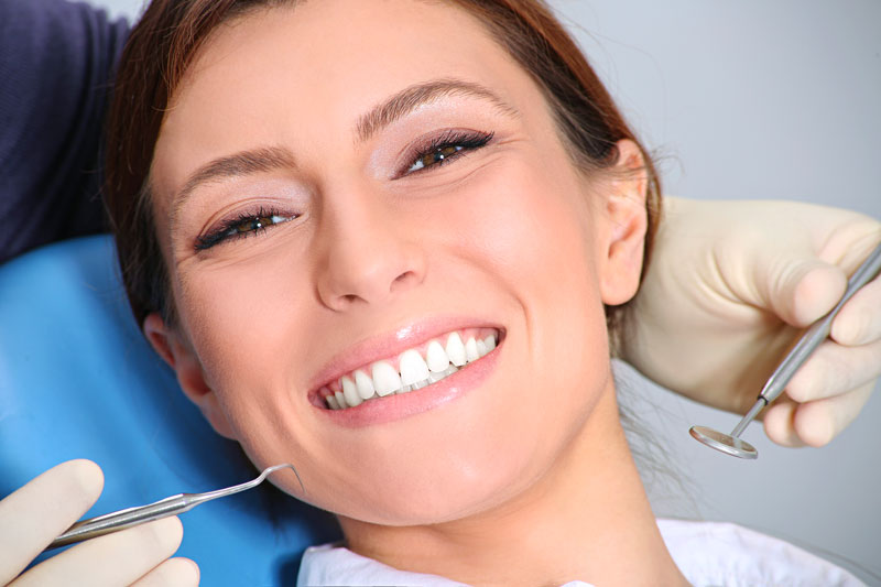 Women Smiling After Successful Cosmetic Dental Procedure