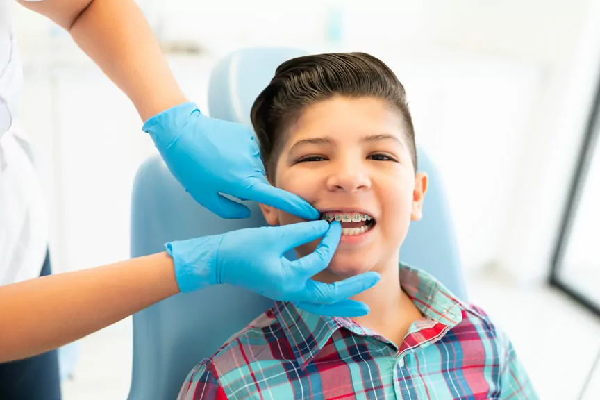 A Boy is Receiving Orthodontic Braces Treatment in Houston, TX