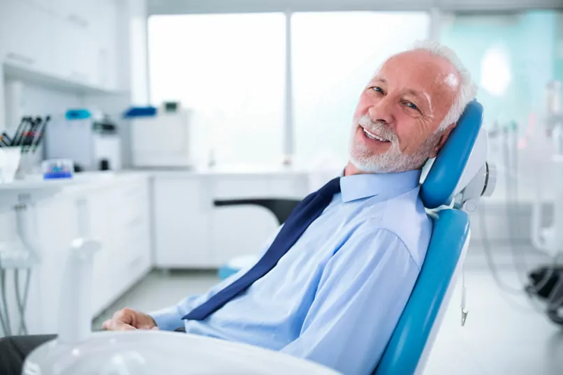 Senior Man Sitting In A Clinic