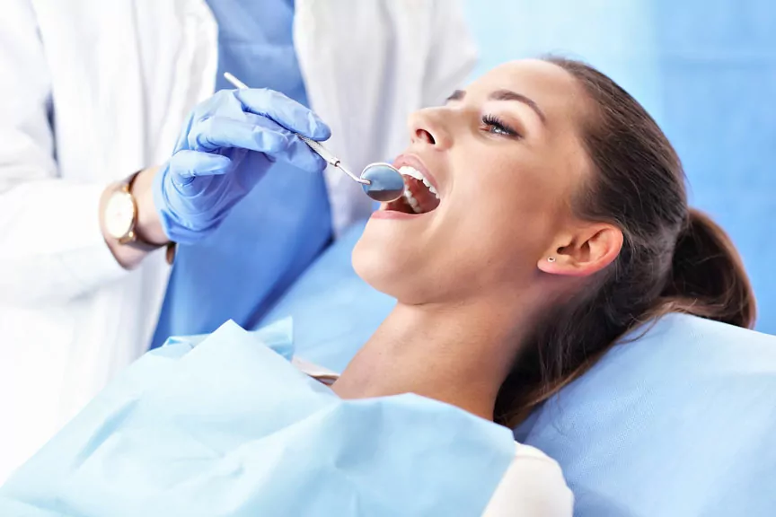 Woman Opening Her Mouth For Treatment