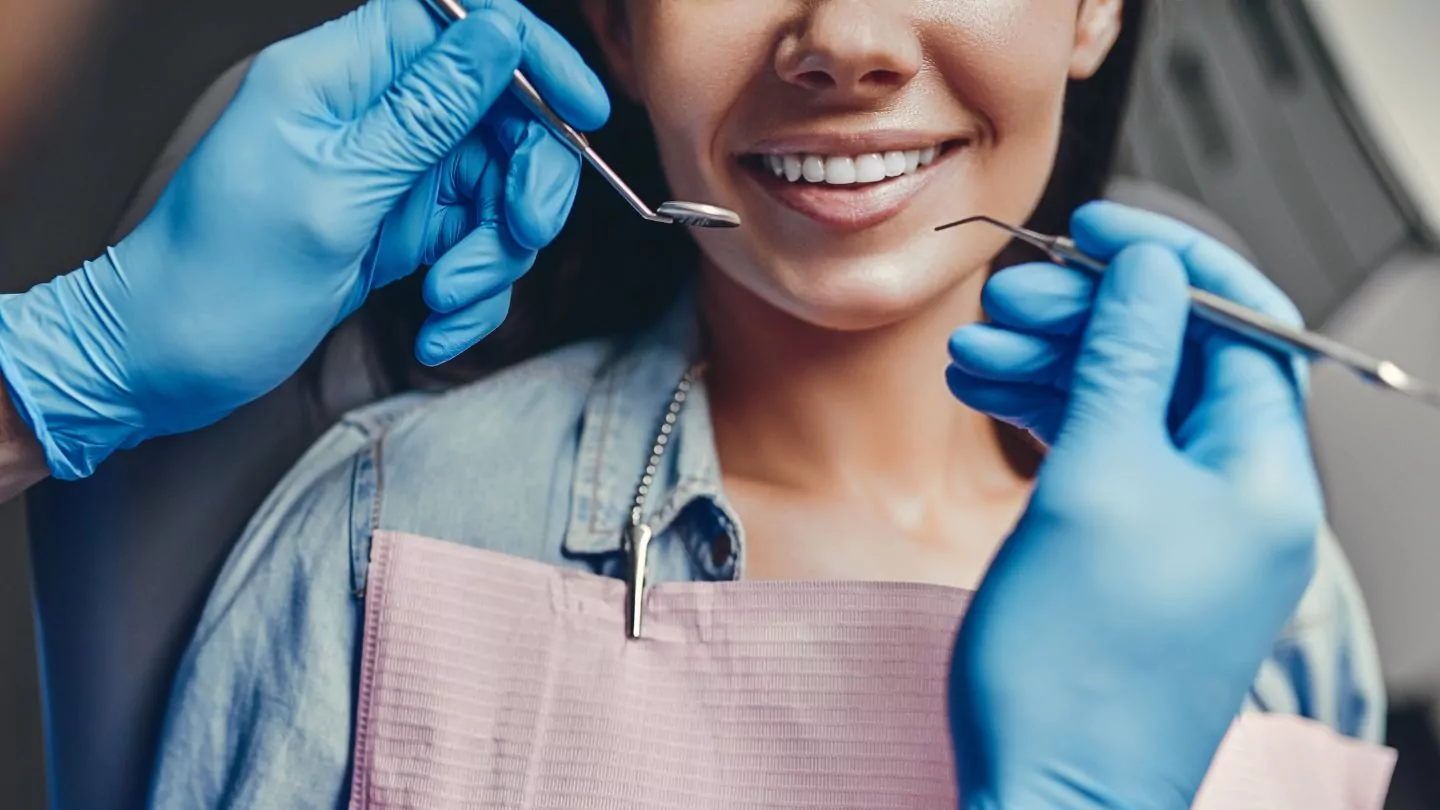 Woman Getting Dental Treatment