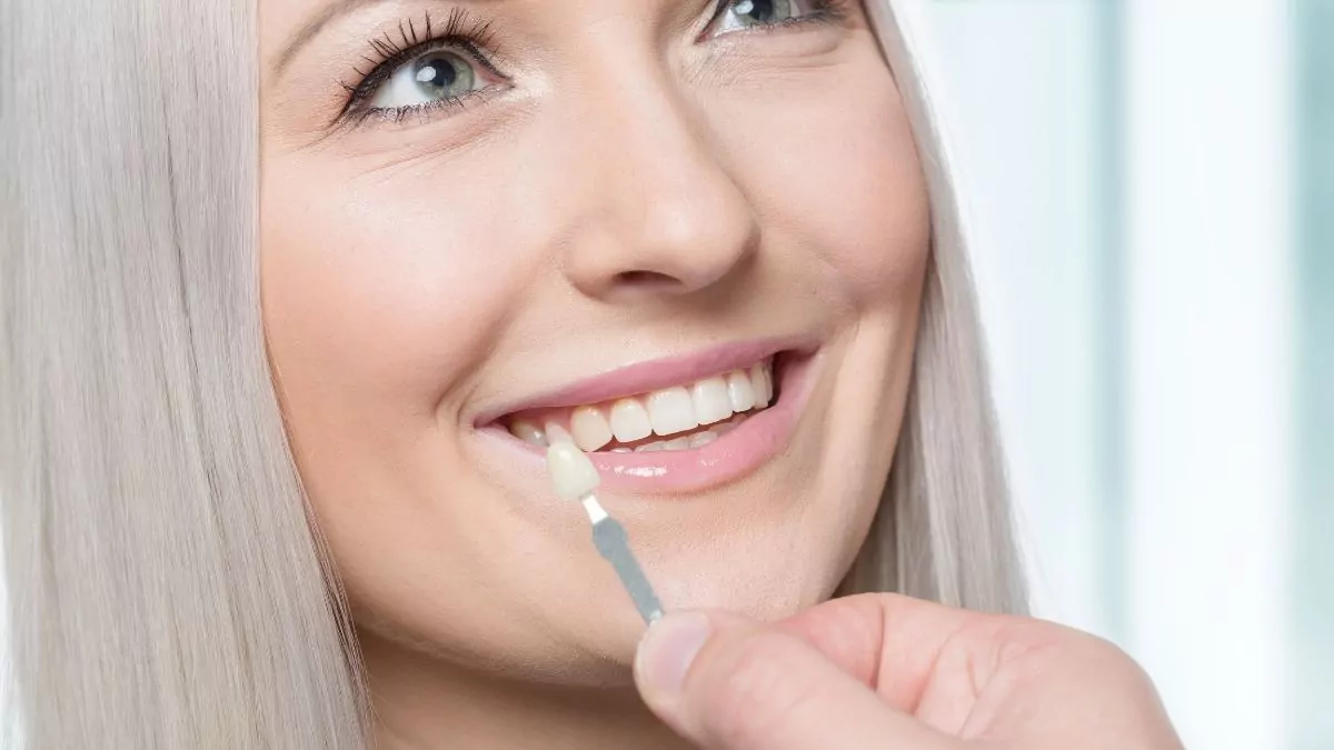 Woman Smiling While Choosing Veneers