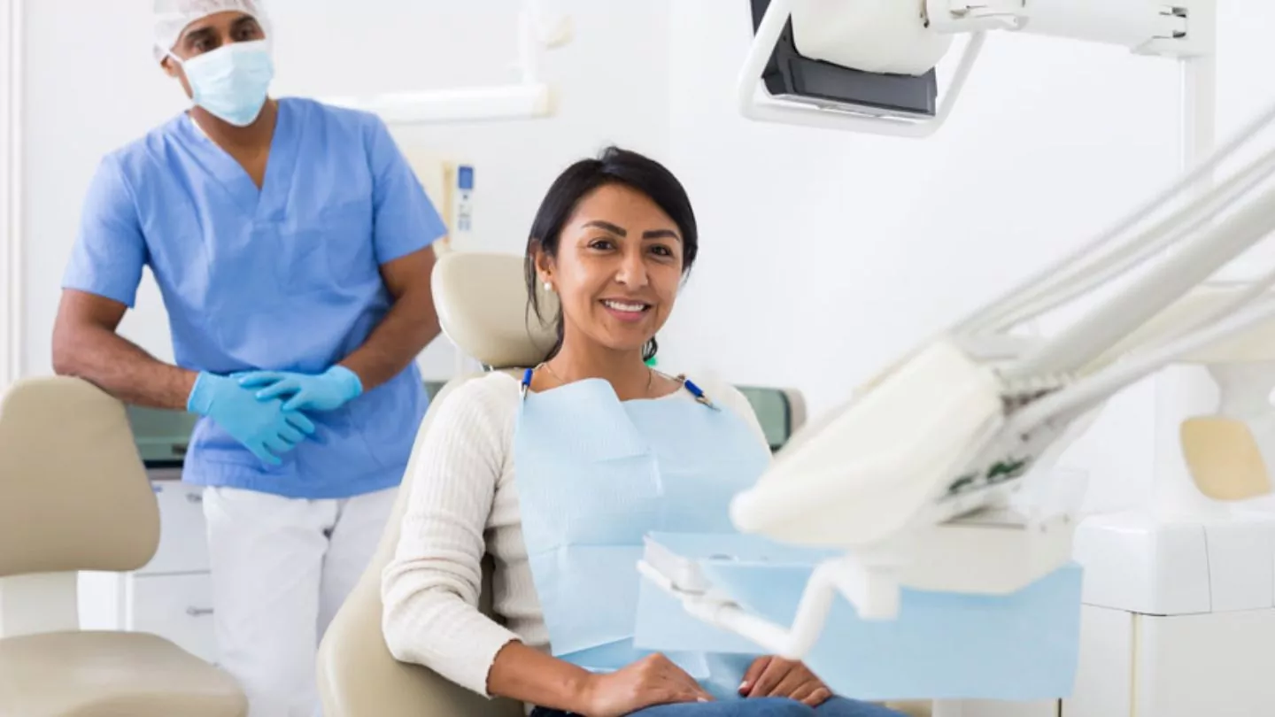 Smiling Woman At Dental Office