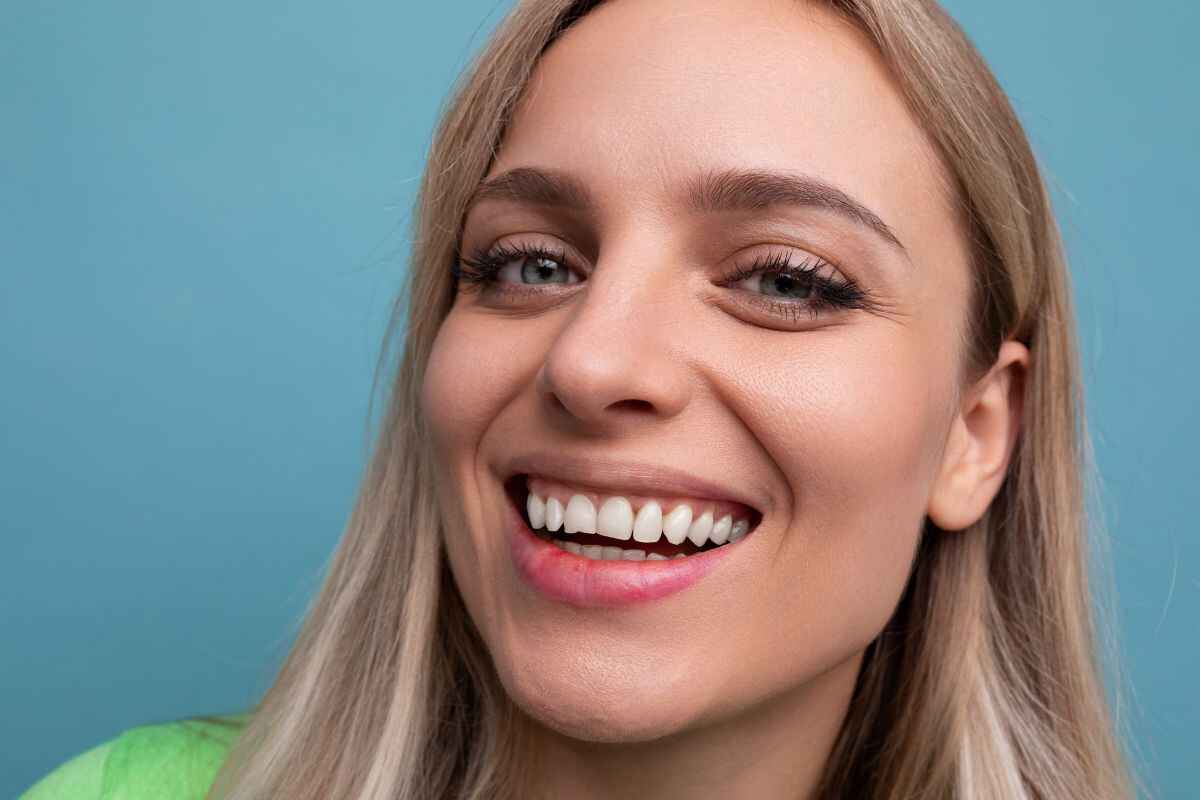Lady smiling after same day cosmetic dental treatment